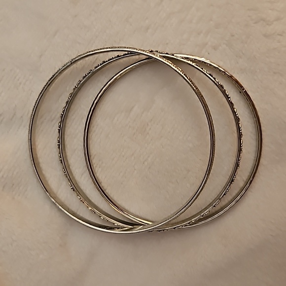 5/$25 Set of Three Textured Silvertone Bangle Bracelets - Picture 4 of 4